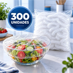 Capa elástica Fresh Cap da Decoricasa vedando tigela de salada com pacote de capas ao fundo em cozinha