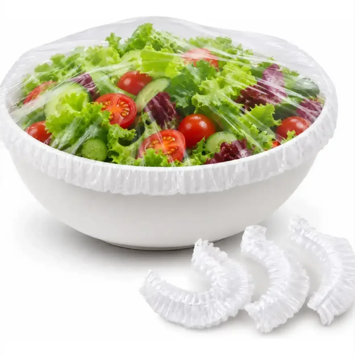 Capa elástica reutilizável Decoricasa vedando tigela com salada fresca, alternativa prática ao plástico filme