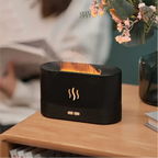 Difusor de aromas Decoricasa preto com efeito de chama LED realista e névoa fria sobre mesa de madeira