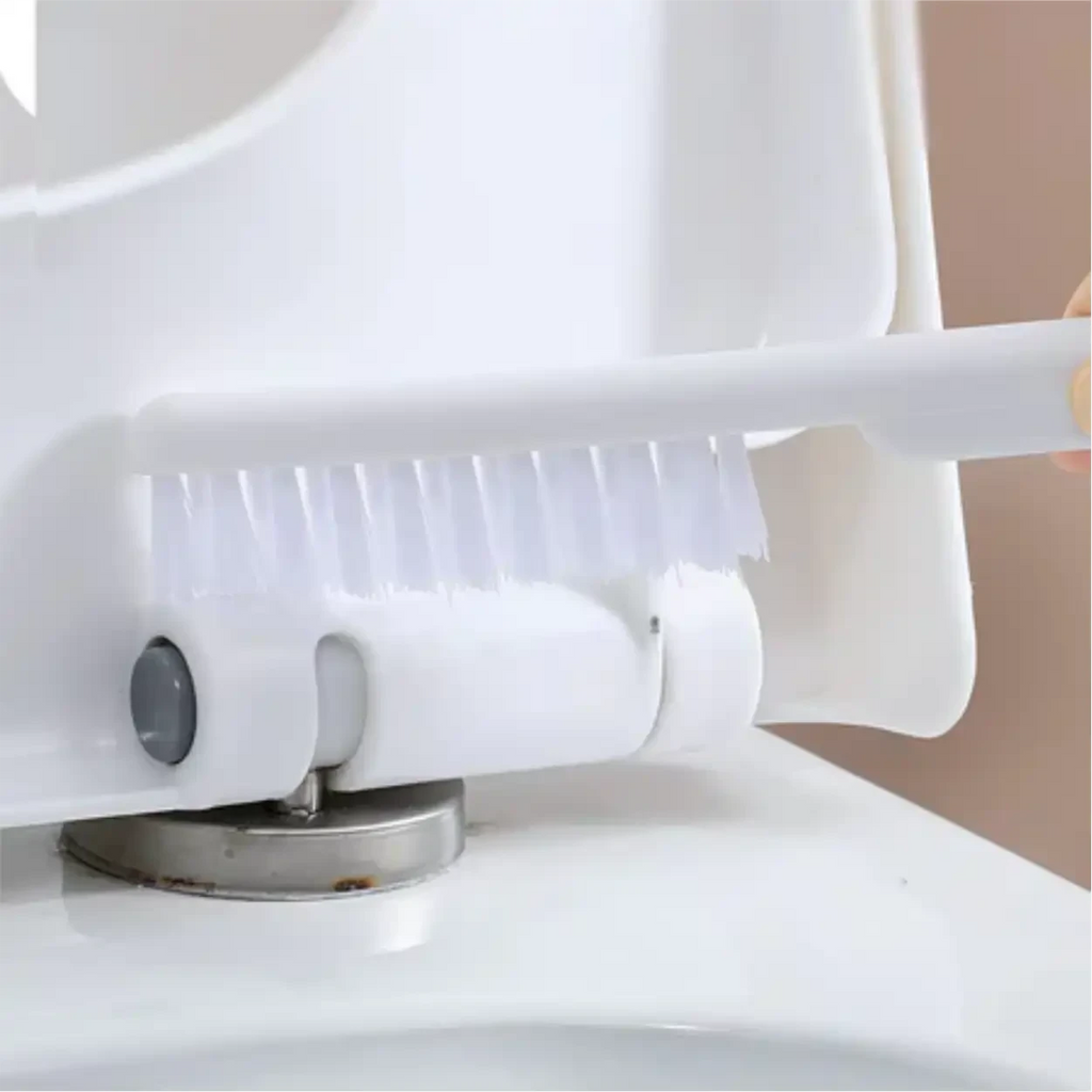 Escova de detalhes Decoricasa de silicone branco limpando as dobradiças do assento sanitário