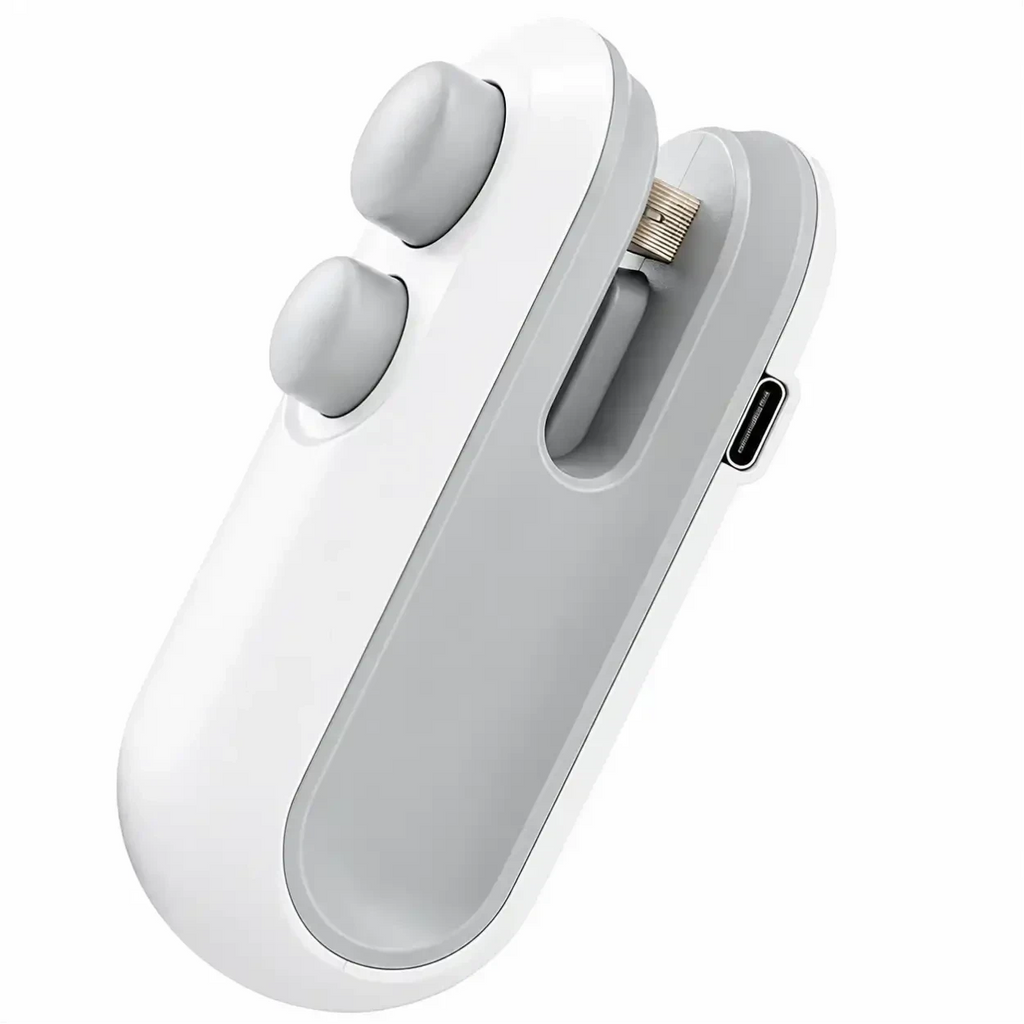 Seladora e cortadora de embalagens Decoricasa branca e cinza, portátil, recarregável via USB com design ergonômico.